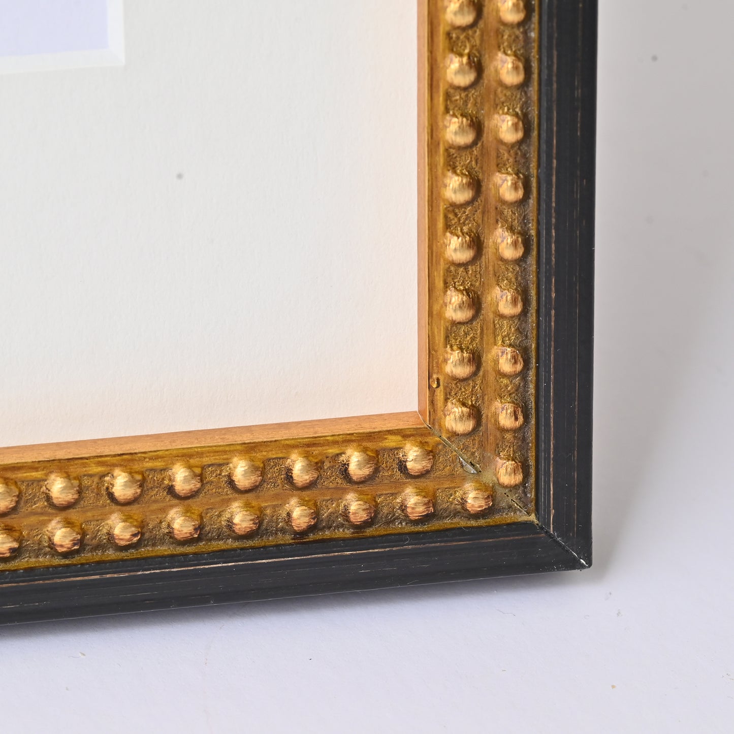 7/8” Burnished Black And Gold Finish On Beaded Profile