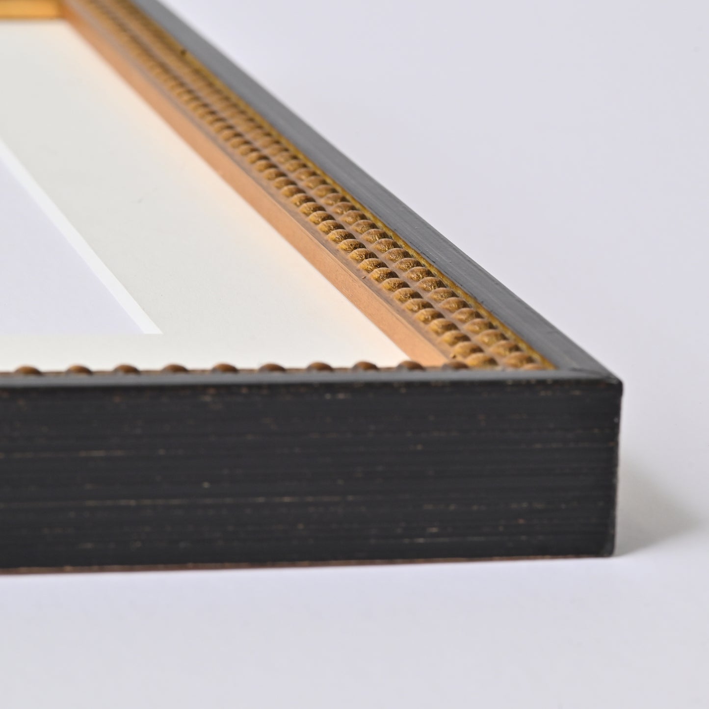 7/8” Burnished Black And Gold Finish On Beaded Profile