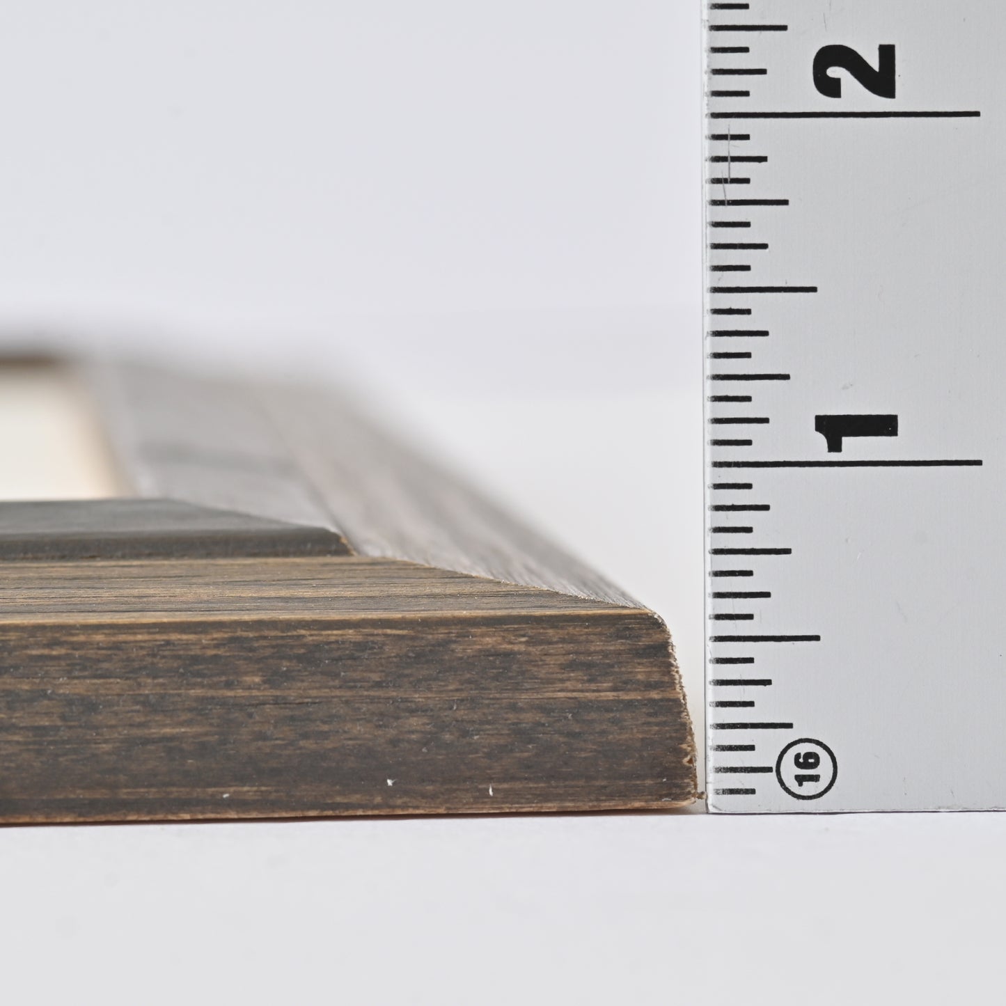 Angled Profile Frame With Iron-Colored Rivet Design on Stained Pine Veneer