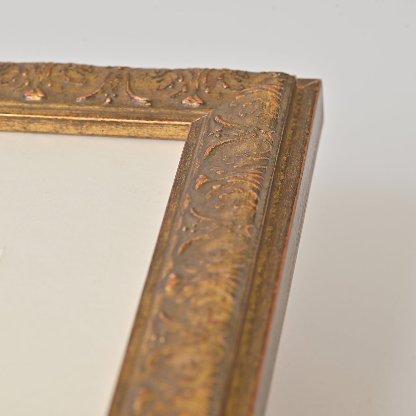 Antique Gold Finish Frame With Red And Black Undertones On Ornate Profile