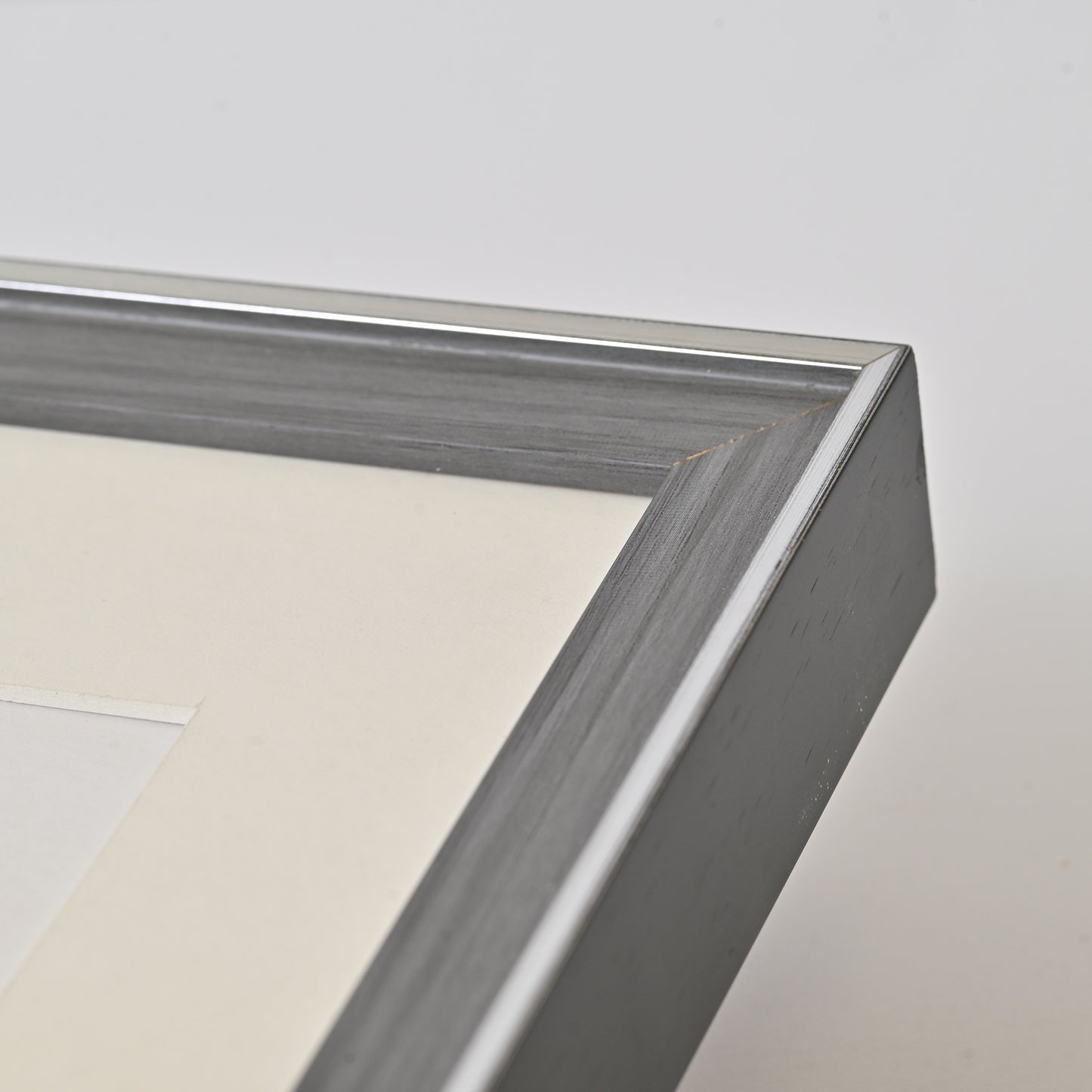 Grey Wood Frame with Raised Silver Trim and Black Edge