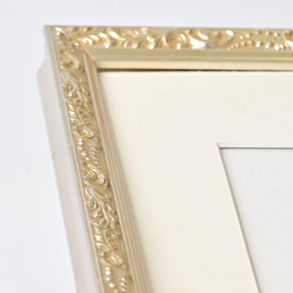 Ornate Bright Silver Gilded Frame On Ornate Motif Pattern