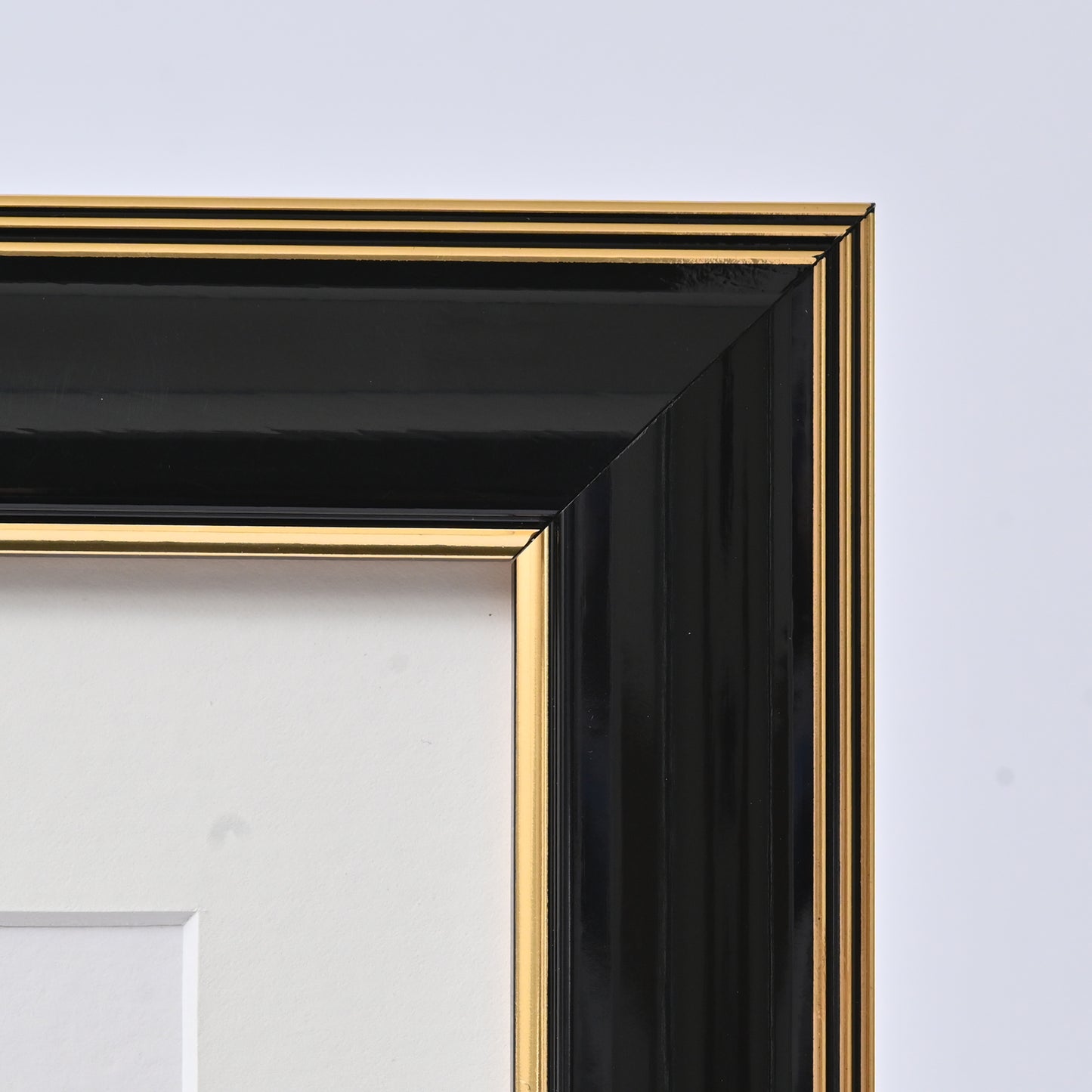 Glossy Black Finish With Gold Lines On A Classic Rounded Profile