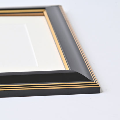 Glossy Black Finish With Gold Lines On A Classic Rounded Profile