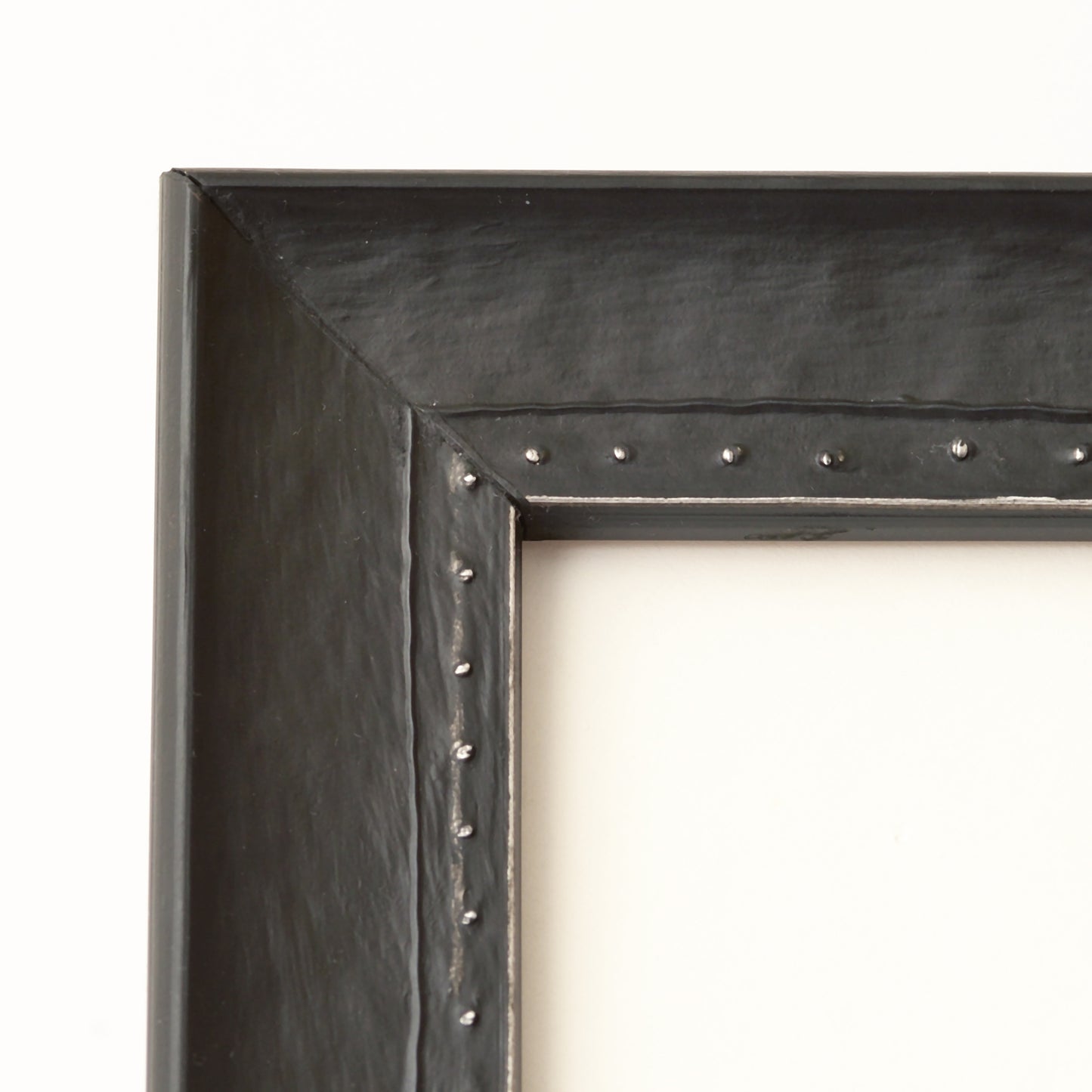 Painted Black Finish Frame With Silver Rivet Design