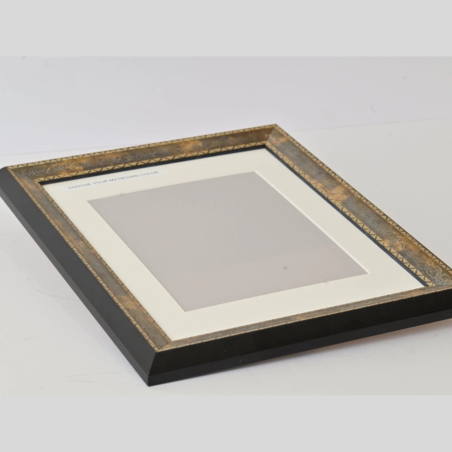 Stained Wood Frame with Carved Pattern Motif and Pyramid Profile