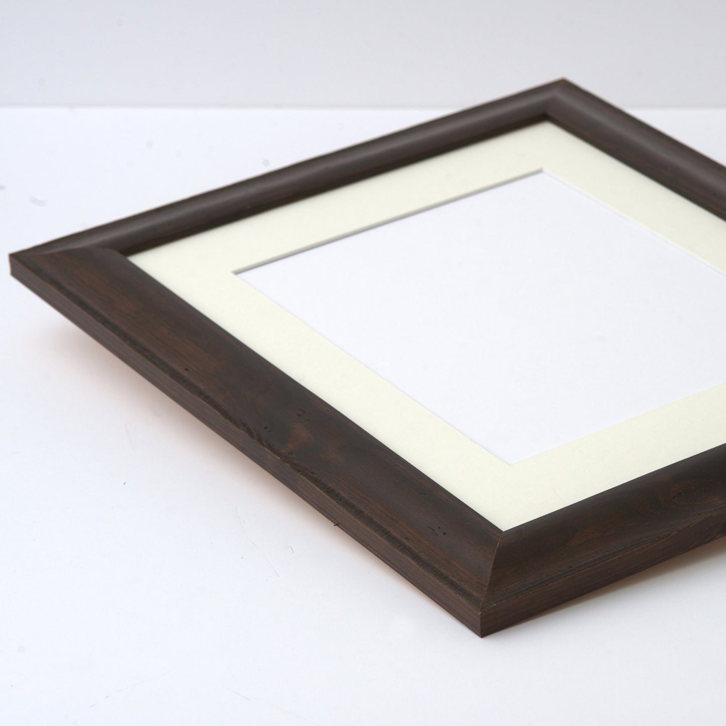 Dark Brown Stained Wood Frame with Rounded Profile