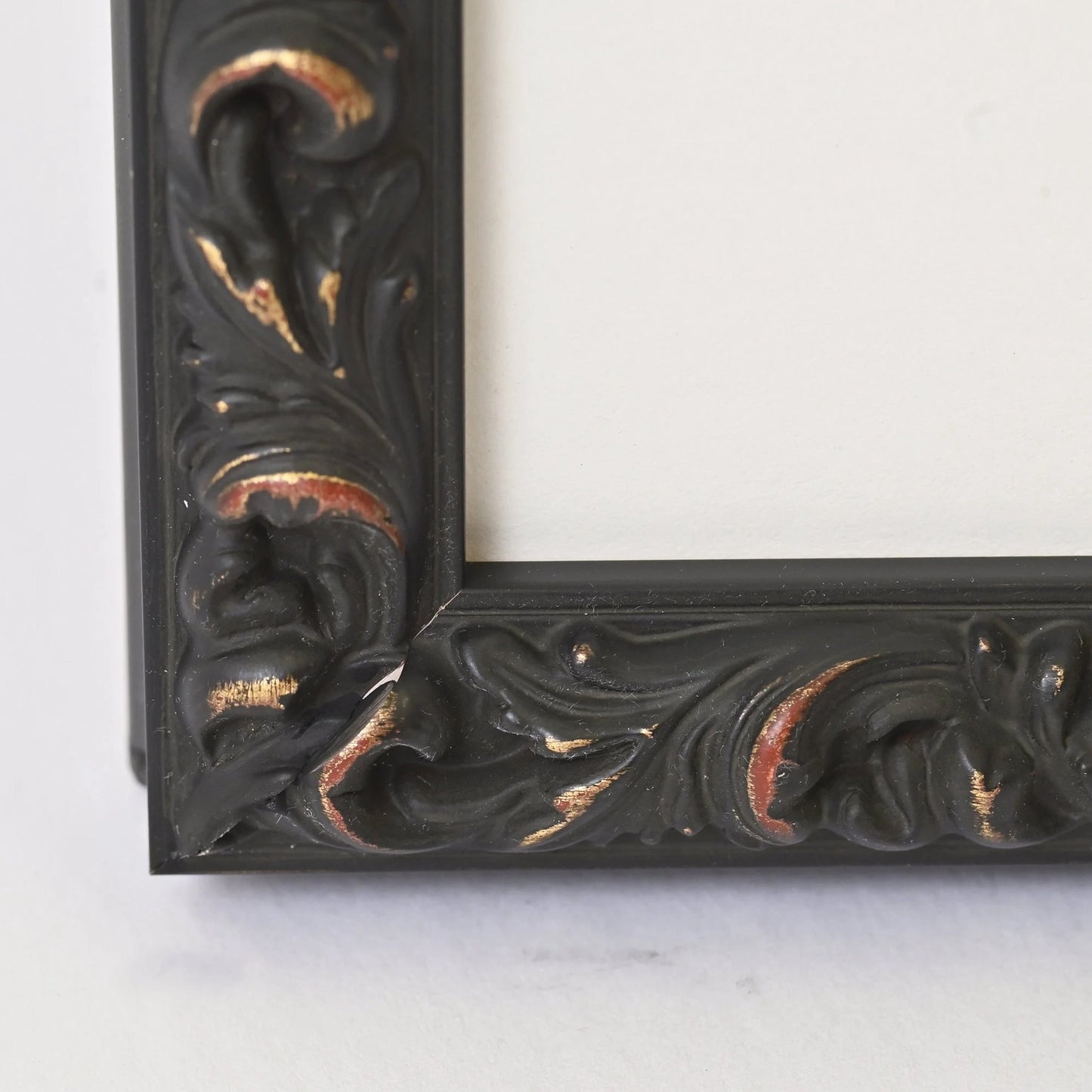 Black Finished Frame With Gold Undertones On Ornate Profile