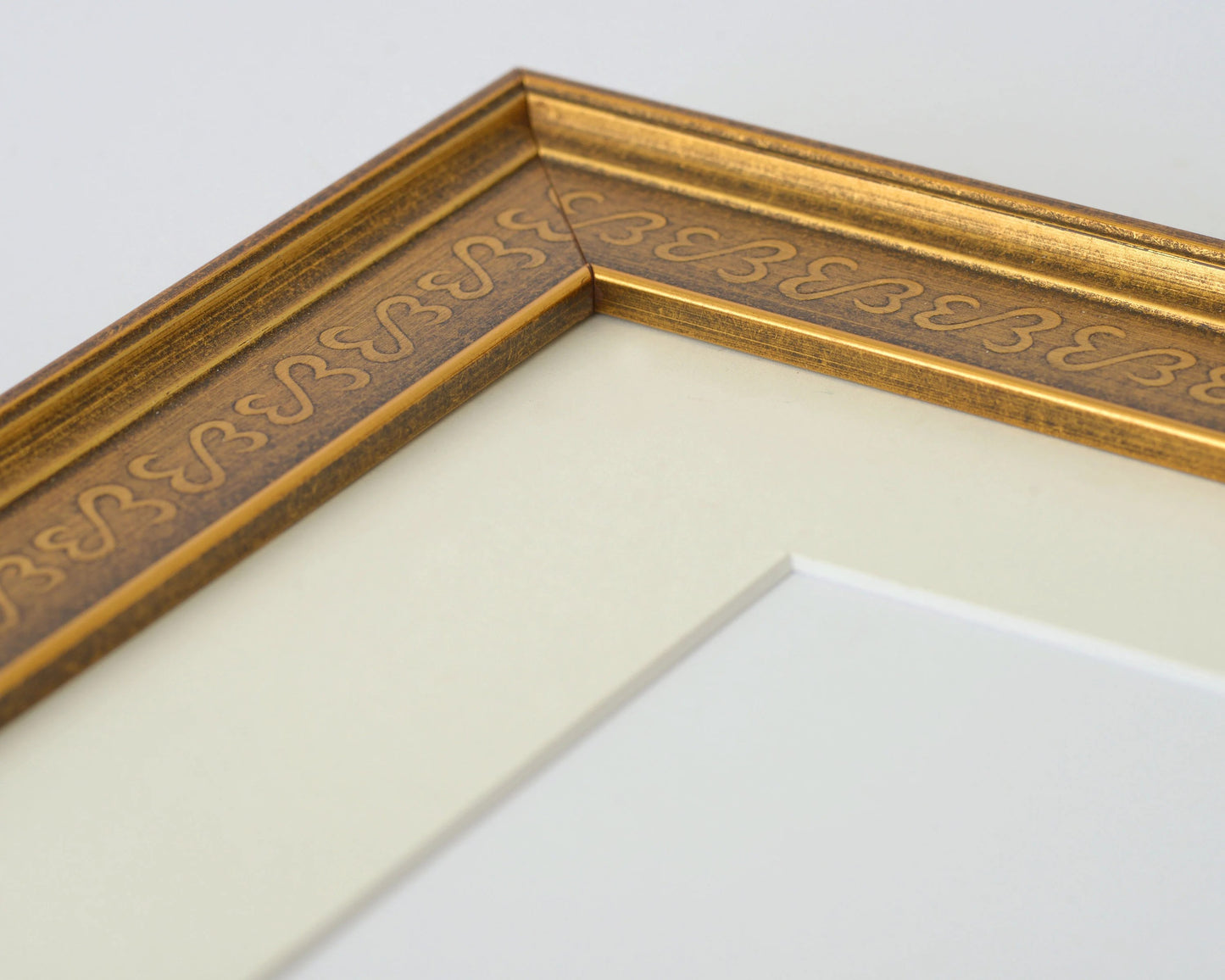 Antiqued Gold Frame With Open-Heart Embossed Pattern